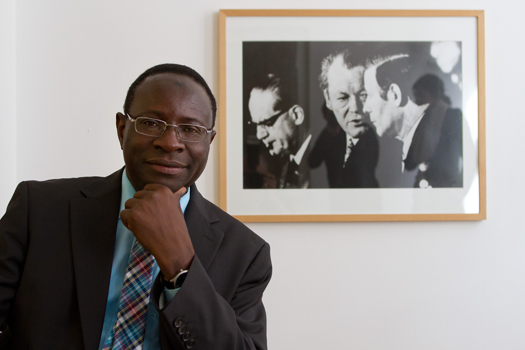 Karamba Diaby, the first African-born German MP poses with the most prominent post-war leaders of his party