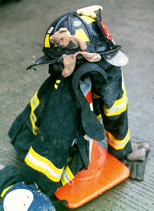 A firefighter has put down his gear near Ground Zero.