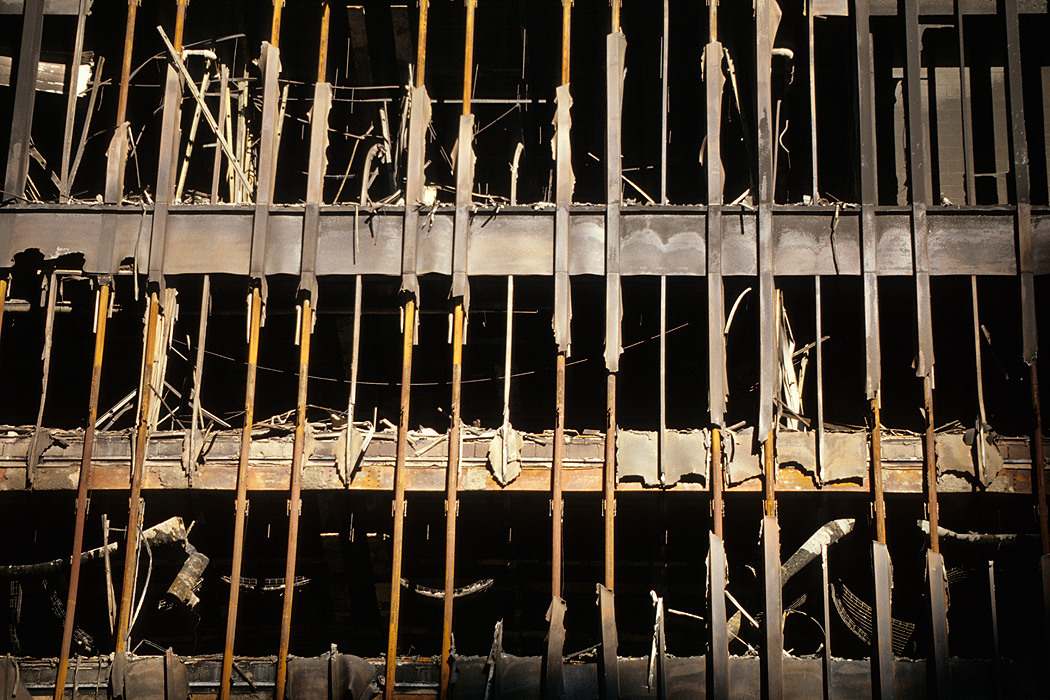 The destroyed façade of World Trade Center 5, one of the low buildings east of the Twin Towers.