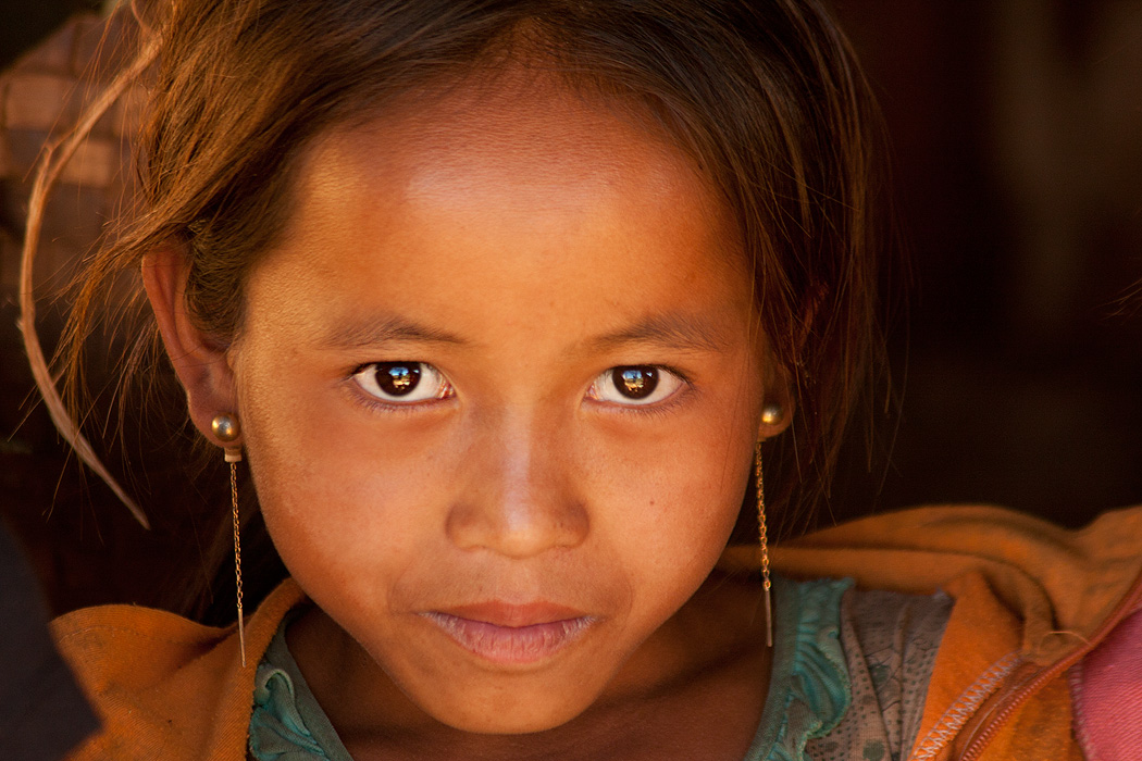 Young girl on a remote farm in rural Attapeu province