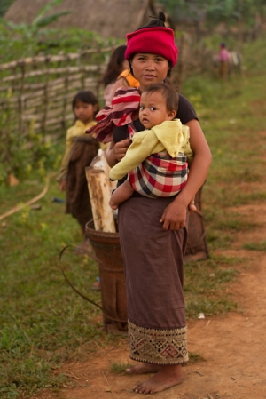 Young mother with child in rural Attapeu province, Laos.