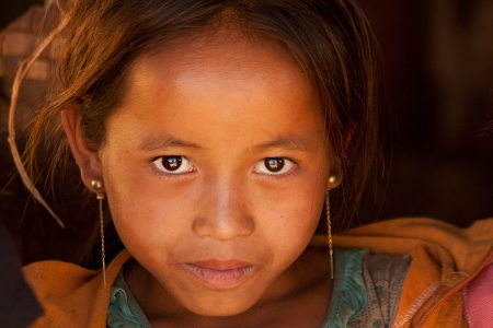 Young girl on a remote farm in rural Attapeu province
