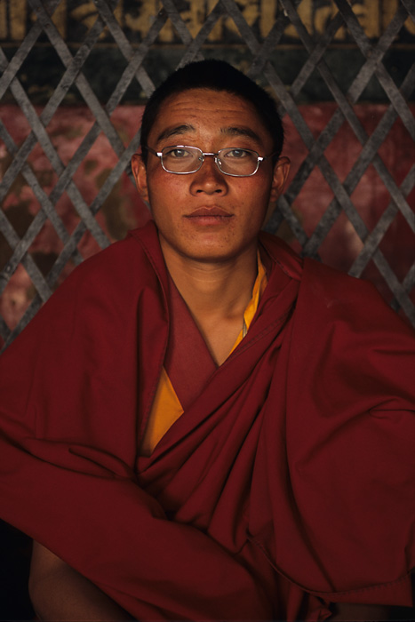 A young monk in the courtyard of the Jokhang